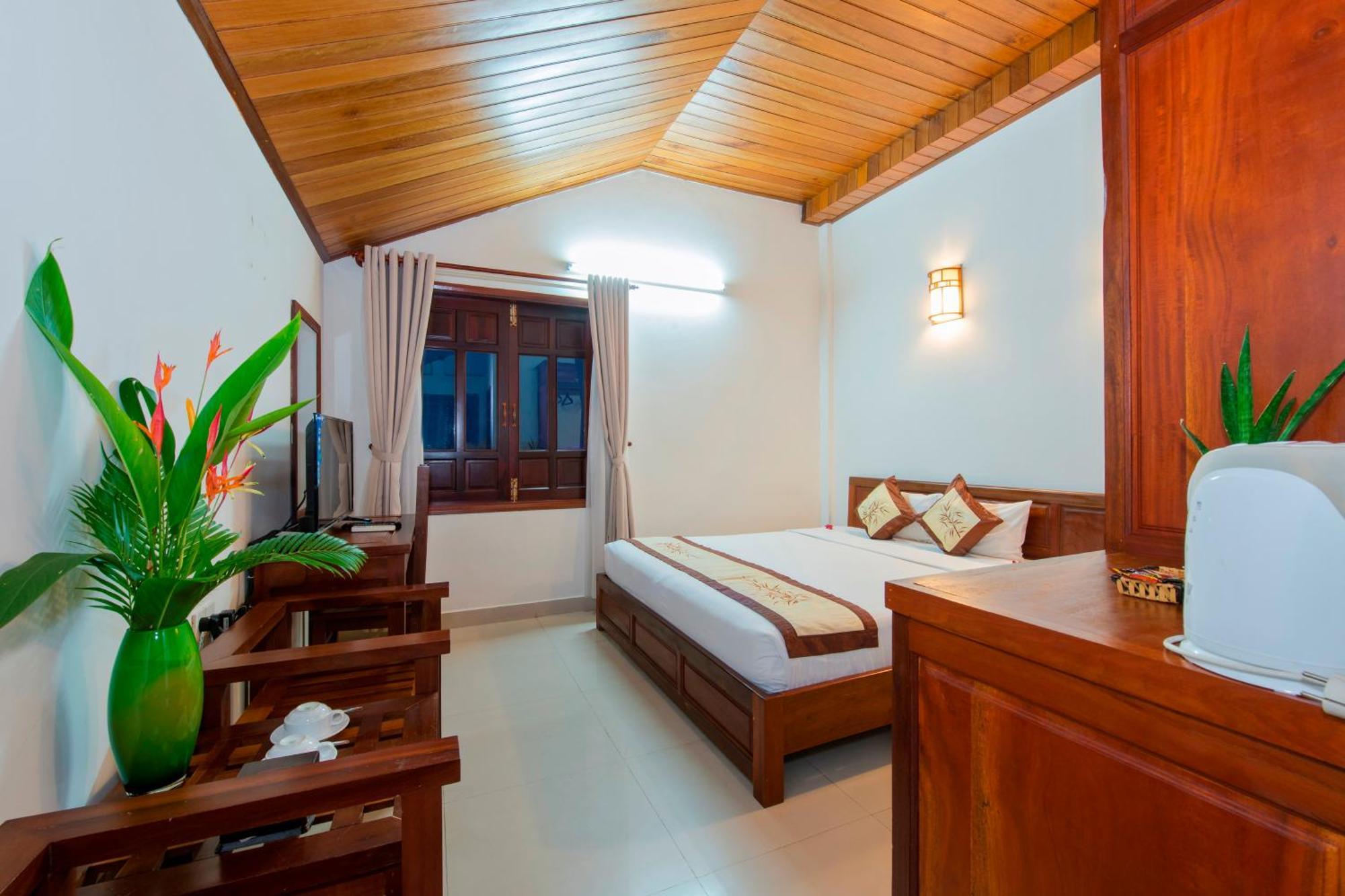 Kiman Hoi An Hotel Værelse billede