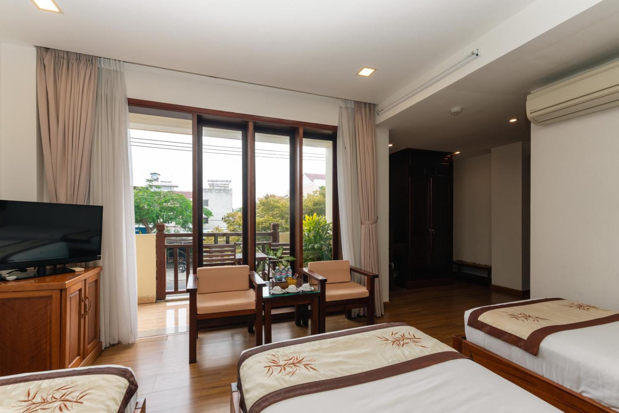 Kiman Hoi An Hotel Værelse billede